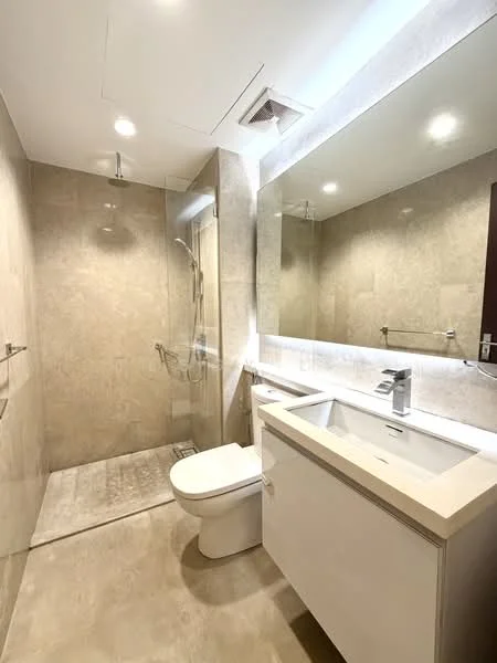 Bathroom features: walk-in shower with glass enclosure, chrome handheld shower, single-sink vanity with white cabinet, white countertop, framed mirror with LED lighting, one-piece toilet, grey tile flooring, recessed downlights, wall-mounted towel bar; style: modern.