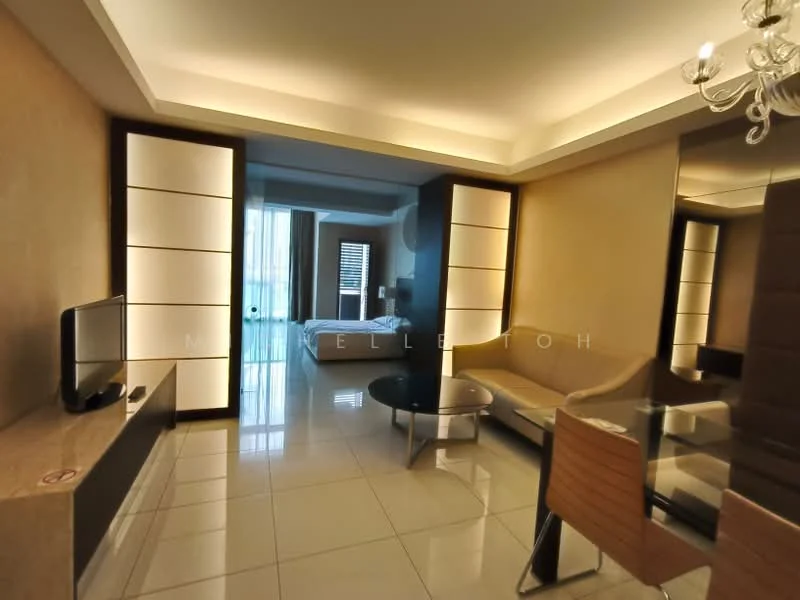 Living features: cream painted walls, glossy tile flooring, chandelier, sofa in beige, glass coffee table, TV console, wall-mounted TV, mirror on wall, dining table with chairs, floor-to-ceiling windows, sheer curtains; style: modern. Room features: bed visible in background, unknown wall color, unknown flooring type.