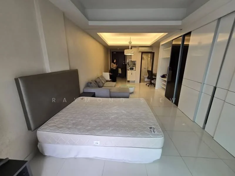 Bedroom features: queen-size bed, upholstered headboard, white walls, recessed ceiling lights, large sliding wardrobe, grey fabric sofa, white tile flooring, decorative ceiling, study desk, open layout; style: modern.