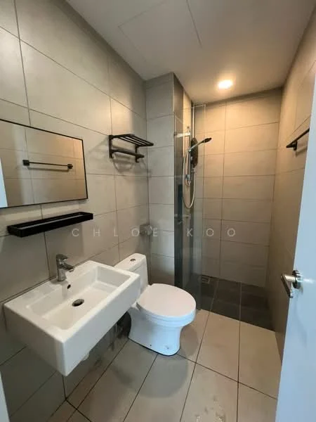 Bathroom features: grey tiled walls, white ceramic sink, chrome basin mixer faucet, one-piece toilet, glass shower enclosure, rain shower head, wall-mounted towel racks, recessed lighting, dark tiled flooring, framed mirror; style: modern.