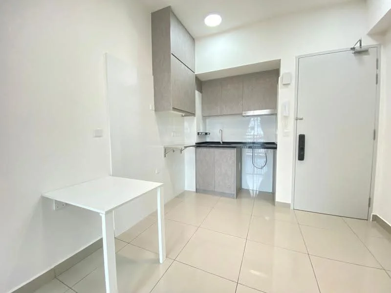 Kitchen features: white painted walls, light grey cabinetry, black countertop, single-bowl stainless-steel sink, chrome pull-down faucet, built-in stove, exhaust hood, tile flooring, recessed downlights, table with white surface, open layout; style: modern.
