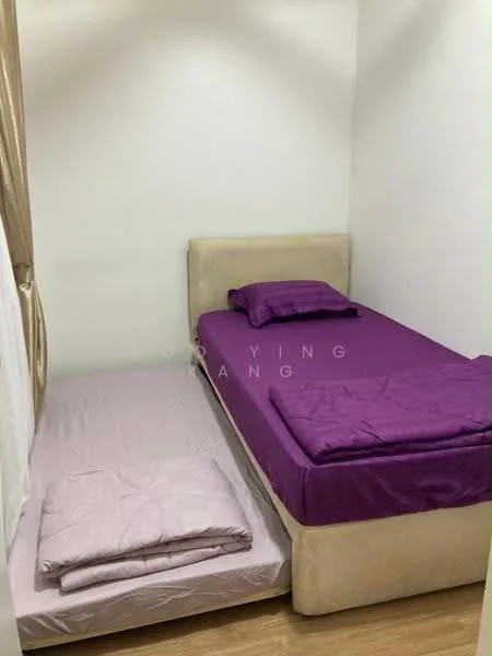 Bedroom features: single bed with beige upholstered headboard, purple bedding, light purple bedding on floor, wooden flooring, white painted walls, curtains in beige, pillow on bed.