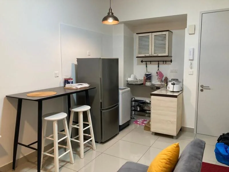 Kitchen features: grey stainless-steel fridge, white countertop, wooden cabinetry with white finish, kitchen sink, electric kettle, rice cooker, microwave, stool seating, pendant light, ceramic tile flooring, white painted walls, open shelving, wall-mounted hooks; style: modern.