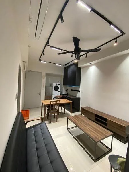 Living features: black leather sofa, wooden coffee table, wooden dining table, wooden dining chair, wall-mounted TV console, white painted walls, glossy tile flooring, 5-blade ceiling fan with light, recessed LED downlights, stackable washer-dryer, kitchen cabinetry in dark finish; style: modern.