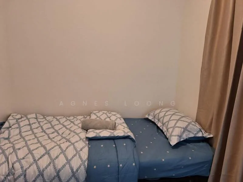 Bedroom features: single bed with blue bedding, two pillows, cream curtains, white painted walls, light blue bedspread with diamond pattern.