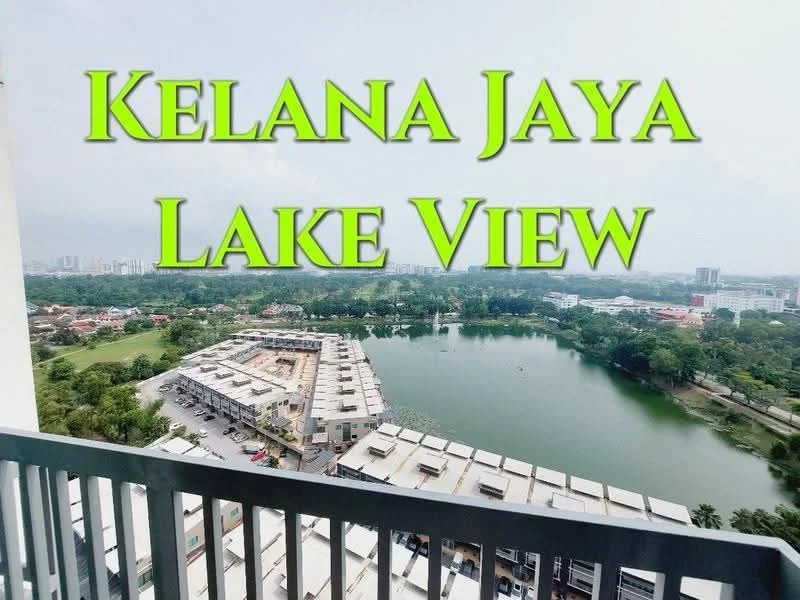 Exterior type: high-rise condominium; features: lake view, surrounded by greenery, near residential area, balcony with railing, multi-storey buildings in view, landscaped gardens, waterfront, urban skyline in background; style: modern.
