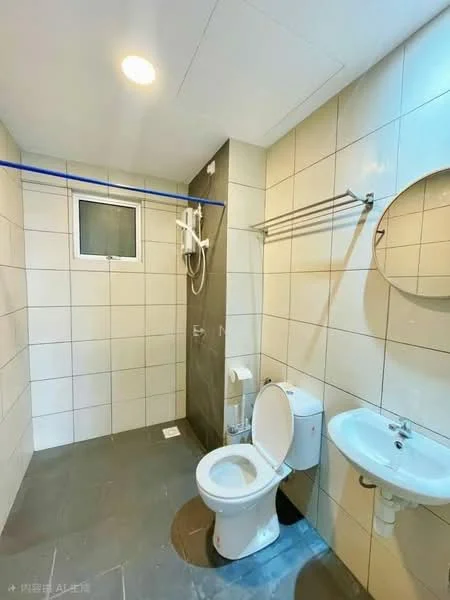 Bathroom features: white ceramic toilet, single-sink vanity with wall-mounted faucet, round mirror, shower area with handheld shower, grey tile flooring, white wall tiles, blue plumbing pipe, towel rack, window for ventilation; style: modern.