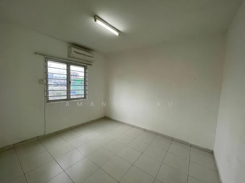 Room features: white painted walls, tile flooring, 1 wall-mounted split AC, single window with metal grille, fluorescent ceiling light; view: city.