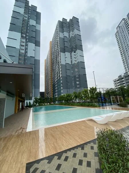 Exterior type: high-rise condominium; features: infinity pool, pool deck with loungers, surrounding greenery, basketball court, modern architectural design, manicured landscaping, paved walkway, multiple high-rise buildings; style: modern.