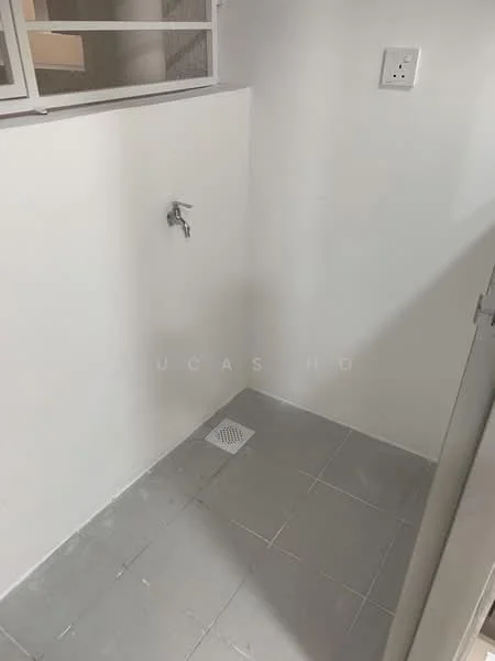 Laundry features: white painted walls, grey tile flooring, wall-mounted faucet, drainage grate on floor, electrical outlet, window for natural light.