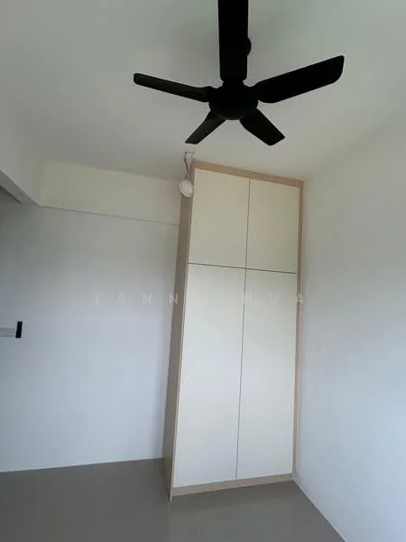 Room features: white painted walls, ceiling fan, built-in wardrobe with white doors, grey tiled flooring.