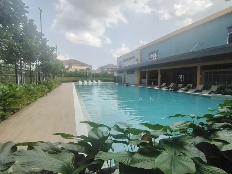 Exterior type: swimming pool deck; features: infinity pool, pool deck with loungers, manicured landscaping, tropical plants, surrounding greenery, modern building facade, sunny weather, clear blue sky; style: modern.