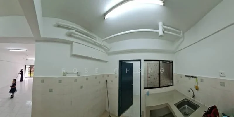 Laundry features: single-bowl stainless-steel sink, chrome faucet, white tiled walls, light grey tiled flooring, exposed plumbing, fluorescent ceiling lights, window with black frame, wall-mounted storage shelf. Room features: open layout, white painted walls, light grey tiled flooring.