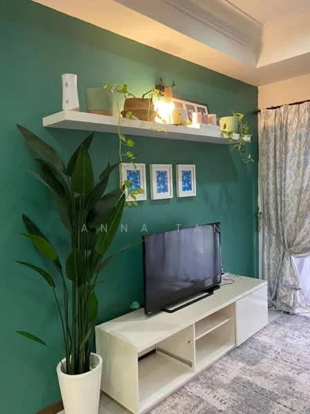 Living features: green painted walls, white floating shelf, decorative plants on shelf, framed artwork on wall, white TV console, flat-screen TV, area rug, curtains with floral pattern, ceiling with crown moulding; style: modern.
