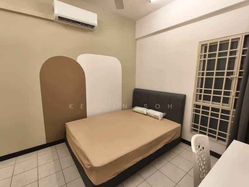 Bedroom features: queen-size bed with beige bedding, grey upholstered headboard, painted accent wall in beige and white, wall-mounted air conditioning unit, tile flooring, window with security grille, white desk with chair, light-colored bedding; style: modern.