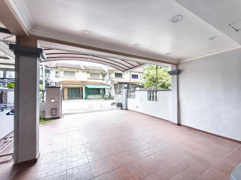 Exterior type: car porch; features: covered car porch, red brick flooring, white painted walls, recessed ceiling lights, metal roof, open space, surrounded by greenery, access to street view; style: modern.