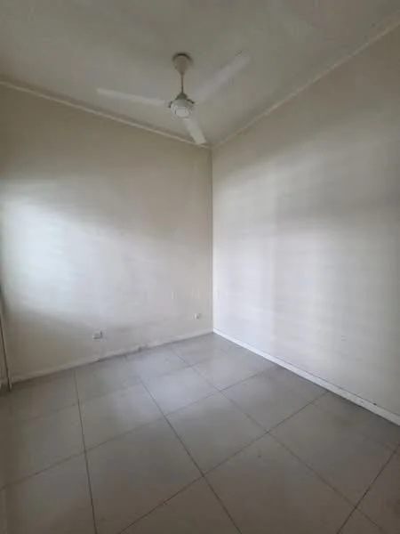 Room features: plain white walls, tile flooring, ceiling fan.