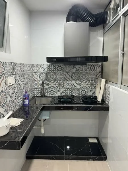 Kitchen features: black granite countertop, wall-mounted range hood, two-burner gas hob, decorative patterned backsplash, white tiled walls, grey tiled flooring, sink with faucet, open shelving, window with metal frame; style: modern.
