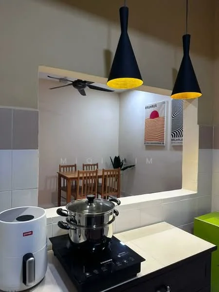 Kitchen features: black pendant lights, ceiling fan, stainless-steel pot on stove, built-in stove, white tiled backsplash, countertop, kitchen island, visible dining area in background, framed artwork on wall; style: modern; view: dining.