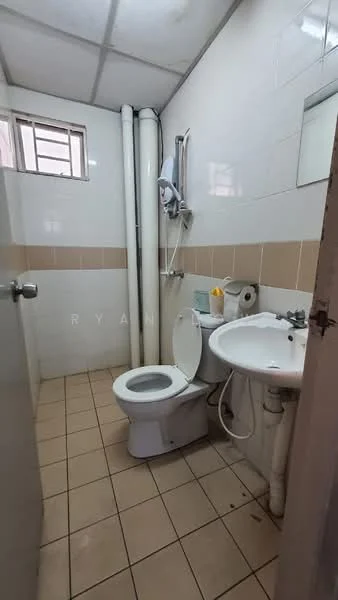 Bathroom features: white tiled walls, beige tiled accents, ceramic tile flooring, one-piece toilet, sink with pedestal, shower with wall-mounted showerhead, window for natural light, exposed plumbing pipes.