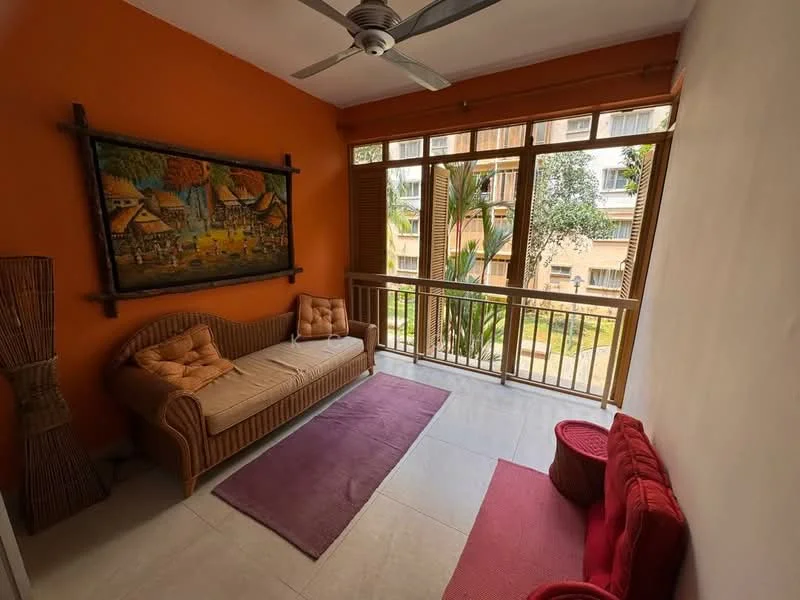 Room features: orange painted walls, white ceiling, sliding glass door, floor-to-ceiling windows, wooden railing, 2-seater fabric sofa in brown, 1-seater fabric chair in red, area rug in purple, area rug in red, decorative wall art, potted plant, tile flooring; style: modern; view: garden.