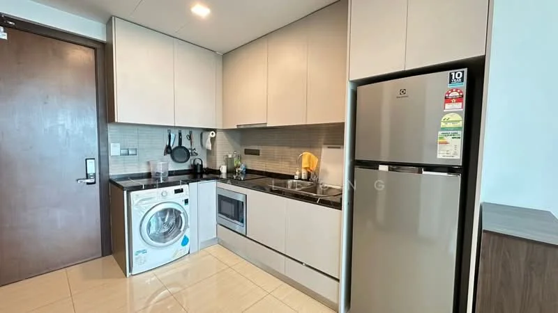 Kitchen features: grey cabinetry, black countertop, stainless-steel fridge, built-in microwave, freestanding washing machine, ceramic tile flooring, white backsplash, kitchen sink, chrome faucet, cooktop, kitchen utensils on wall rack, wall-mounted cabinets; style: modern.