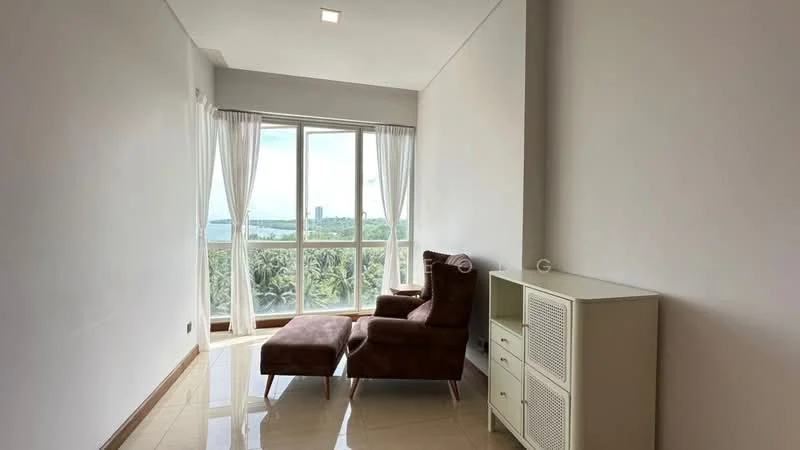 Room features: large floor-to-ceiling windows, brown fabric chaise lounge, white sheer curtains, cream painted walls, glossy tile flooring, small white cabinet, view of greenery and water, natural light; style: modern; view: garden.