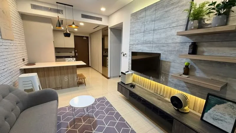 Living features: grey fabric 3-seater sofa, white round coffee table, TV console with built-in lighting, wall-mounted TV, decorative wall shelves, geometric area rug in purple, pendant lighting with multiple bulbs, white walls with wood accent panel, tile flooring, potted plant on shelf; style: modern. Kitchen features: kitchen island with wooden cabinetry, stainless-steel sink, built-in oven, microwave, white cabinets, open shelving, tile backsplash; style: modern.