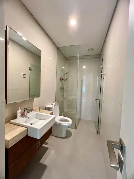 Bathroom features: single-sink vanity with wood cabinet, chrome basin mixer faucet, framed mirror, one-piece toilet, walk-in shower with glass enclosure, rain shower head, tile cladding on walls, grey tile flooring, recessed downlights; style: modern.