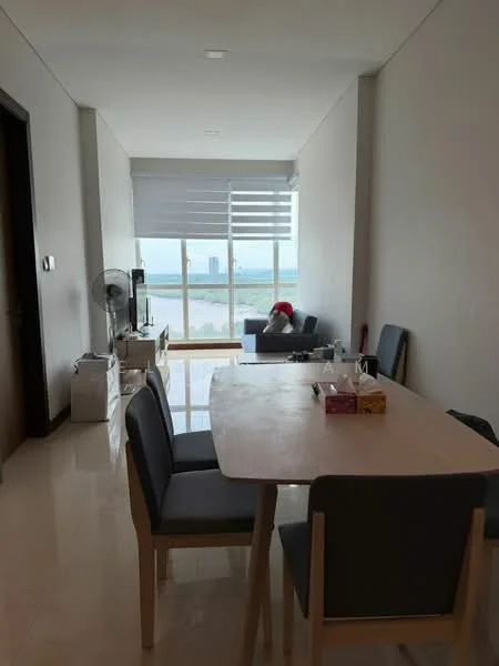 Dining features: 6-seater dining table, grey upholstered dining chairs, large windows with sheer roller blinds, white painted walls, polished tile flooring, ceiling lights, fan, view of city skyline; style: modern; view: city. Living features: sofa, coffee table, TV console, decorative items, large windows with sheer roller blinds; style: modern; view: city.