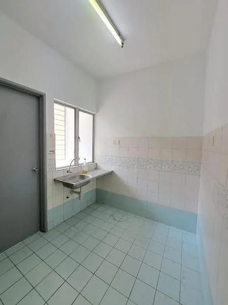 Laundry features: white painted walls, light grey tiled flooring, single-bowl stainless-steel sink, wall-mounted faucet, window with grid pattern, countertop next to sink, light fixture on ceiling, tile cladding halfway up the wall.