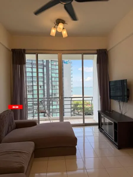 Living features: L-shape sectional sofa in beige, floor-to-ceiling windows, sliding glass door, curtains, ceiling fan with light, wall-mounted TV, TV console, tile flooring, balcony view of the sea, decorative wall; style: modern; view: sea.
