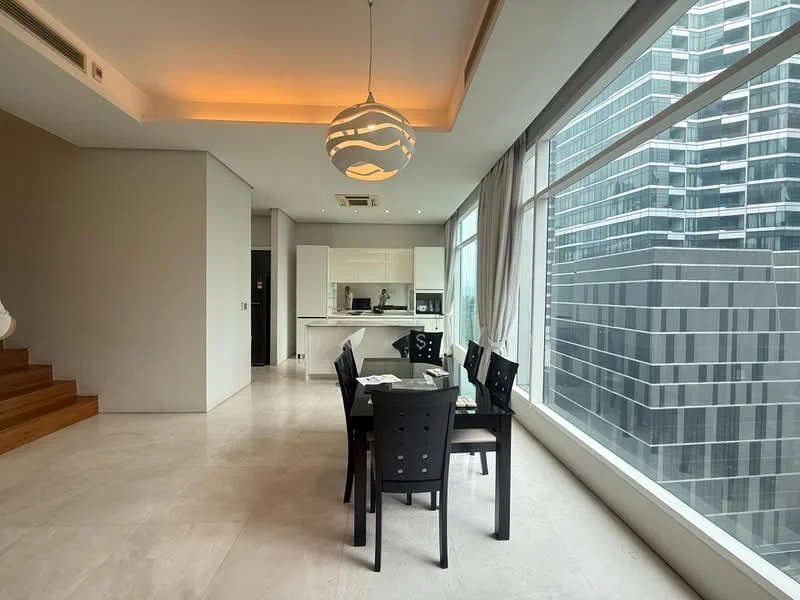 Dining features: 6-seater dining table, black dining chairs, pendant lamp, large floor-to-ceiling windows, neutral wall colour, marble flooring, recessed ceiling lighting, open layout to kitchen; style: modern; view: city. Kitchen features: white cabinetry, stainless-steel appliances, built-in oven, microwave, kitchen island, quartz countertop; style: modern; view: city.
