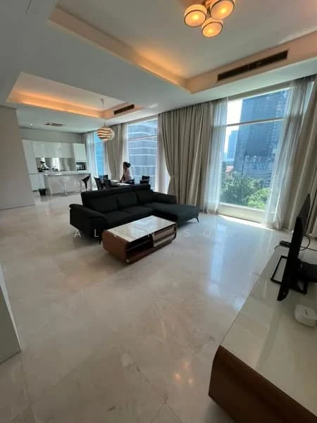 Living features: marble tile flooring, white painted walls, tray ceiling with recessed lighting, floor-to-ceiling windows, sheer curtains, 3-seater fabric sofa in dark grey, coffee table with wooden base, TV console, wall-mounted TV, decorative pendant light; style: modern; view: city.