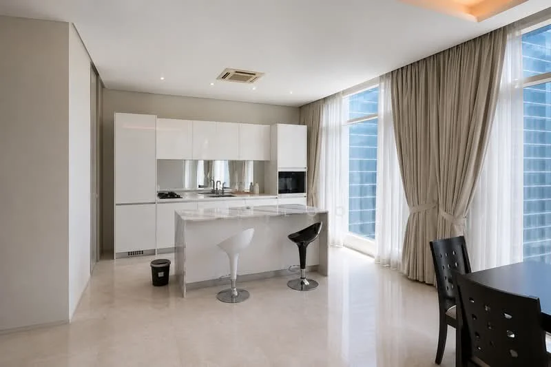 Kitchen features: white cabinetry, marble countertop, stainless-steel sink, chrome pull-down faucet, built-in oven, freestanding range oven, refrigerator, bar stools, pendant lighting, floor-to-ceiling windows, cream tiled flooring, sheer curtains; style: modern; view: city.