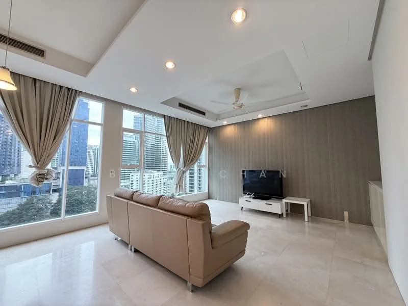 Living features: cream leather sofa, marble tile flooring, tray ceiling with recessed lighting, 5-blade ceiling fan, floor-to-ceiling windows, sheer curtains, wood accent wall, TV console, wall-mounted TV, decorative wall paneling; style: modern; view: city.