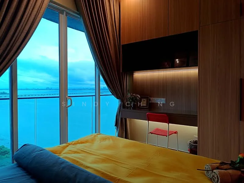 Bedroom features: king-size bed with yellow bedding, floor-to-ceiling windows, ocean view, wooden panelled walls, built-in wardrobe with lighting, study desk with red chair, curtains in brown fabric, recessed LED lighting; style: modern; view: sea.