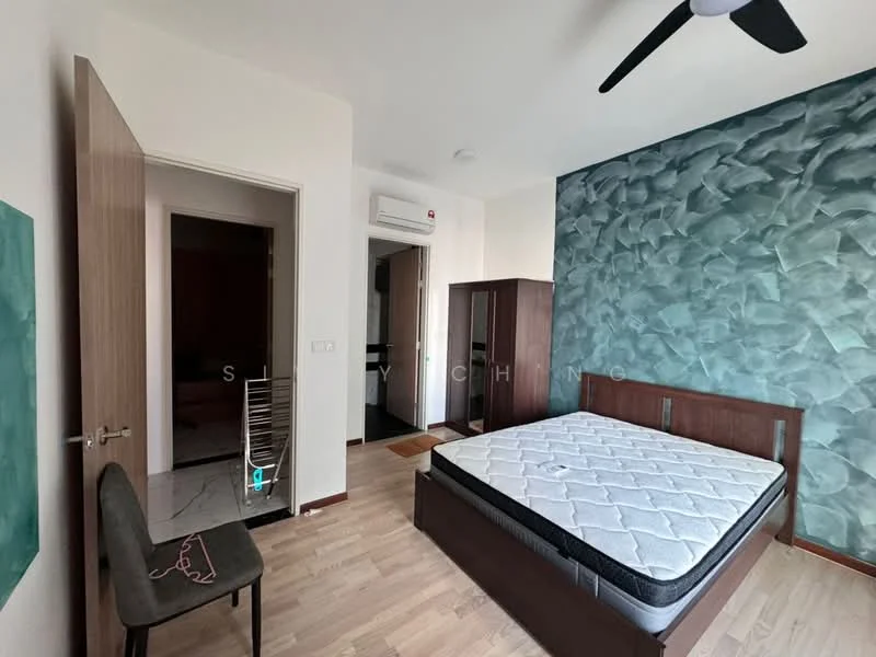 Bedroom features: queen-size bed, wood bed frame, green textured accent wall, light wood flooring, ceiling fan, built-in wardrobe, door to hallway, chair, mattress without bedding; style: modern. Room features: door to bathroom, laundry rack.