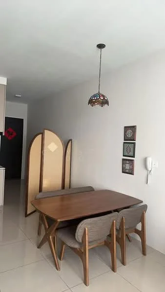 Dining features: wooden dining table, 4 upholstered dining chairs, pendant light fixture with stained glass, cream painted walls, glossy tile flooring, decorative wall art, room divider screen; style: modern.