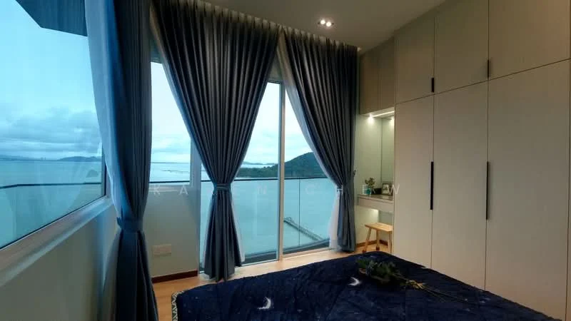 Bedroom features: floor-to-ceiling windows, grey curtains, built-in wardrobe with sliding doors, wooden flooring, blue bedspread with floral pattern, small wooden stool, decorative plant on the bed, view of the sea, recessed ceiling lights, mirror on the wall; style: modern; view: sea.