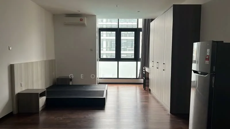 Living features: dark wood flooring, white painted walls, large floor-to-ceiling window, air conditioning unit, built-in wardrobe, refrigerator, small platform area, desk, neutral color palette; style: modern; view: city.
