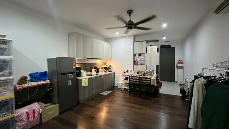 Kitchen features: dark wood flooring, white painted walls, ceiling fan, grey cabinetry, stainless-steel fridge, built-in oven, electric kettle, toaster, sink, countertop with under-cabinet lighting, dining table with chairs, open shelving, decorative items on countertop; style: modern. Room features: clothes rack, storage boxes, various items on floor.