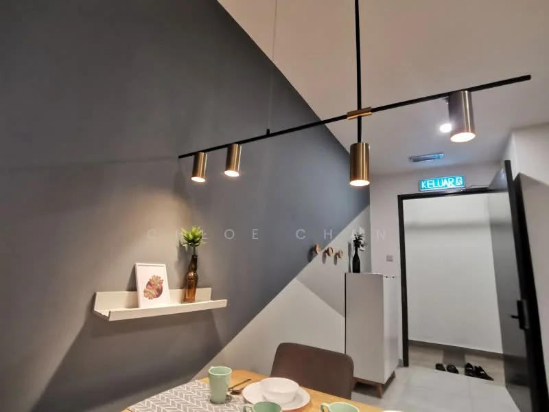 Dining features: grey accent wall, white painted walls, recessed downlights, 4 pendant lights, wooden dining table, upholstered dining chairs, decorative plant on shelf, shelf with framed artwork, floor tiles in light grey, open doorway to hallway; style: modern.