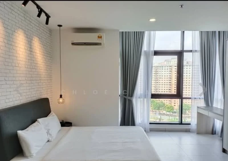 Bedroom features: white painted walls, exposed brick accent wall, grey upholstered headboard, queen-size bed, 2 white pillows, floor-to-ceiling windows, sheer curtains, blackout curtains, 1 wall-mounted split AC, recessed downlights, pendant light, light grey tile flooring, wooden desk, chair; style: modern; view: city.