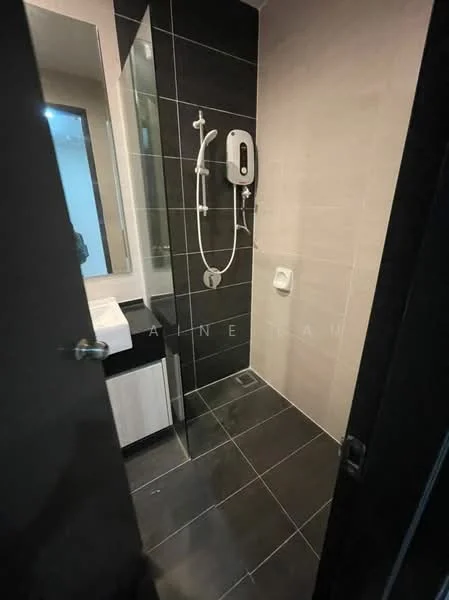 Bathroom features: black tiled walls, grey tiled flooring, walk-in shower with glass enclosure, shower head, wall-mounted water heater, single-sink vanity with cabinet, mirror above vanity, toilet, chrome faucet, built-in drainage, towel holder; style: modern.
