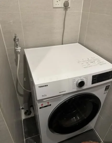 Laundry features: front-load washing machine in white, grey tiled walls, grey tiled flooring, water supply connection, drainage outlet, power outlet, minimalist design; style: modern.