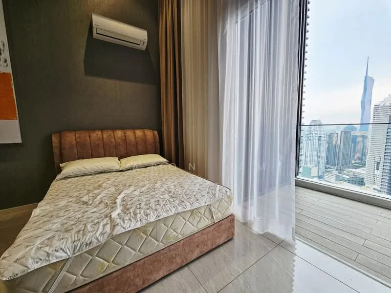 Bedroom features: king-size bed, upholstered headboard, floor-to-ceiling windows, sheer curtains, wall-mounted split AC, grey accent wall, light-colored flooring, city skyline view; style: modern; view: city.