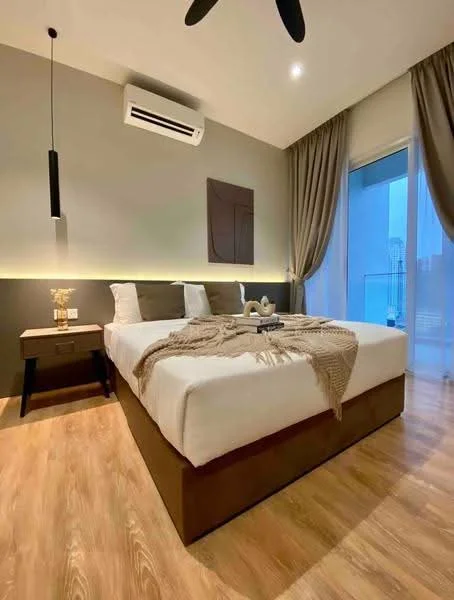 Bedroom features: king-size bed, upholstered headboard, bedside table, table lamp, 5-blade ceiling fan, wall-mounted air conditioning unit, floor-to-ceiling windows, curtains, wooden flooring, decorative wall art, soft throw blanket; style: modern; view: city.