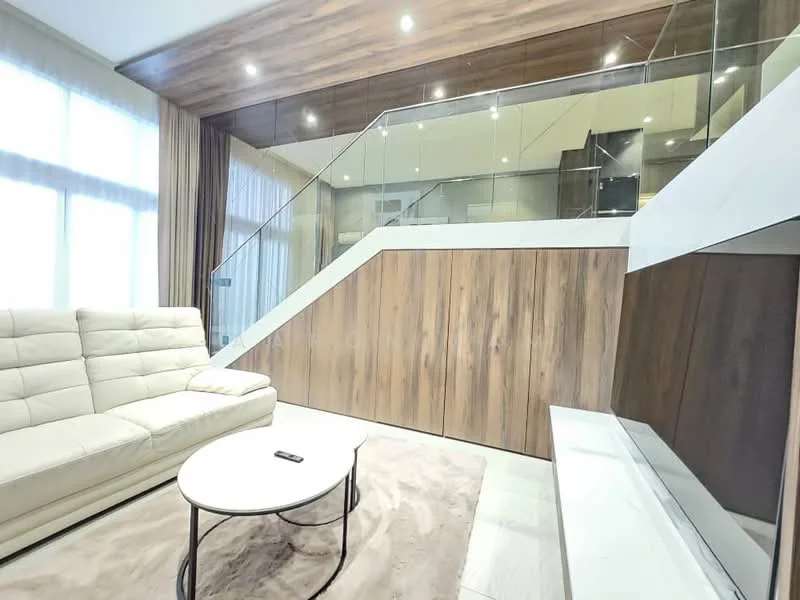 Living features: cream leather sectional sofa, round coffee table with black metal frame, light-colored area rug, wood panel accent wall, glass railing, recessed downlights, large windows with sheer curtains, wooden ceiling, white wall with built-in shelf; style: modern.