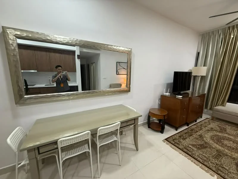 Living features: cream painted walls, white ceiling, recessed downlights, large decorative mirror, wooden dining table with metal legs, 3 white plastic dining chairs, brown wooden side table, brown wooden TV console, wall-mounted TV, beige fabric sofa, area rug with intricate pattern, floor-to-ceiling curtains, tile flooring; style: modern. Kitchen features: brown wooden cabinetry, white countertop, stainless-steel sink, built-in kitchen appliances; style: modern.